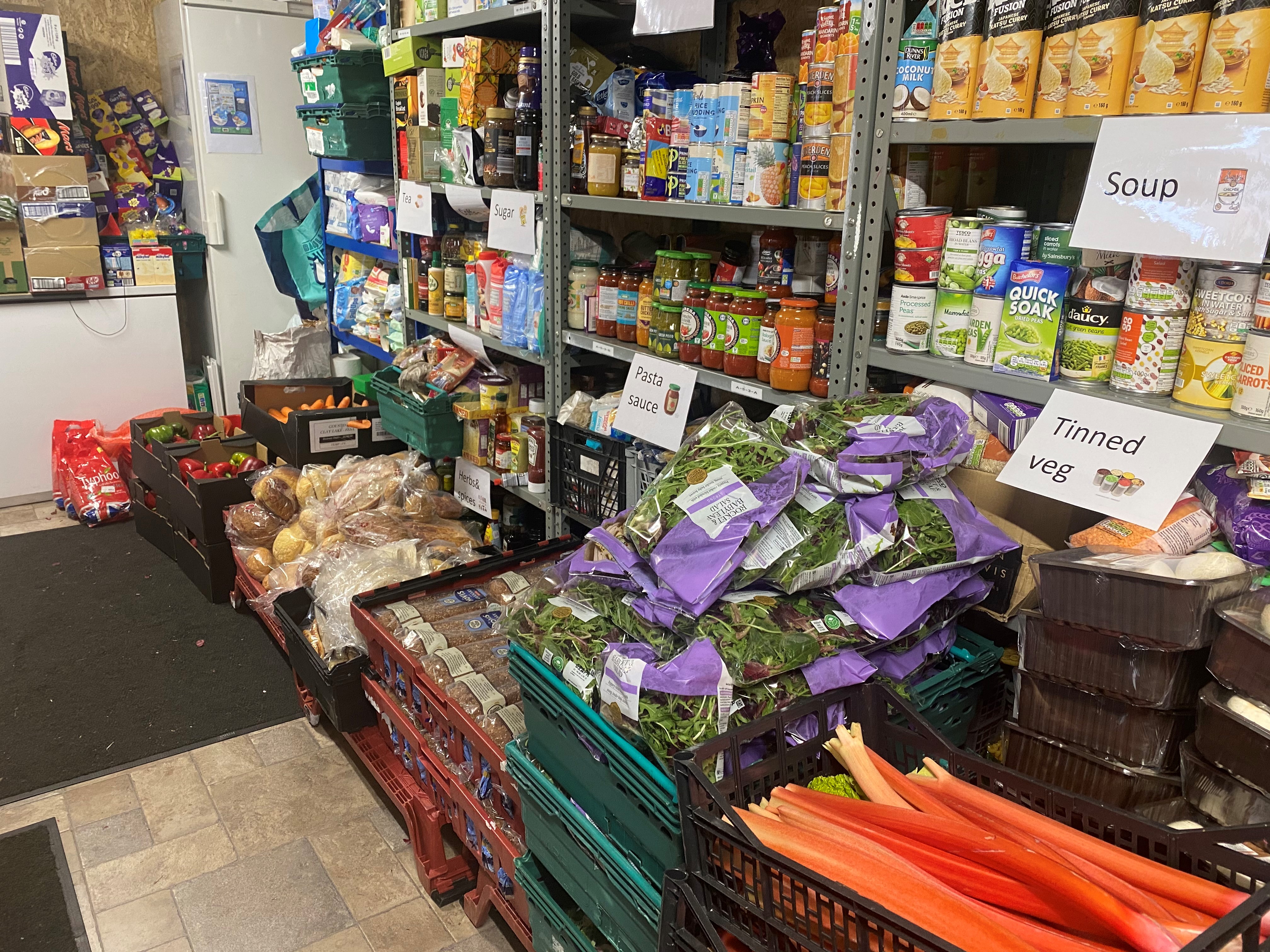 crates plus shelves of food to be distributed